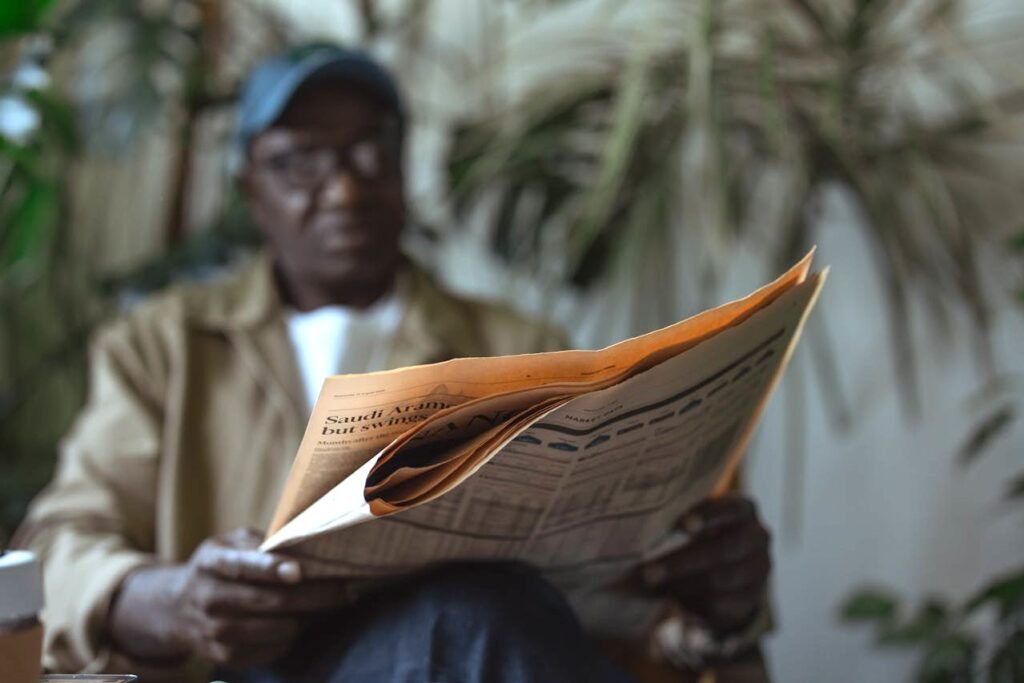 man reading newspaper